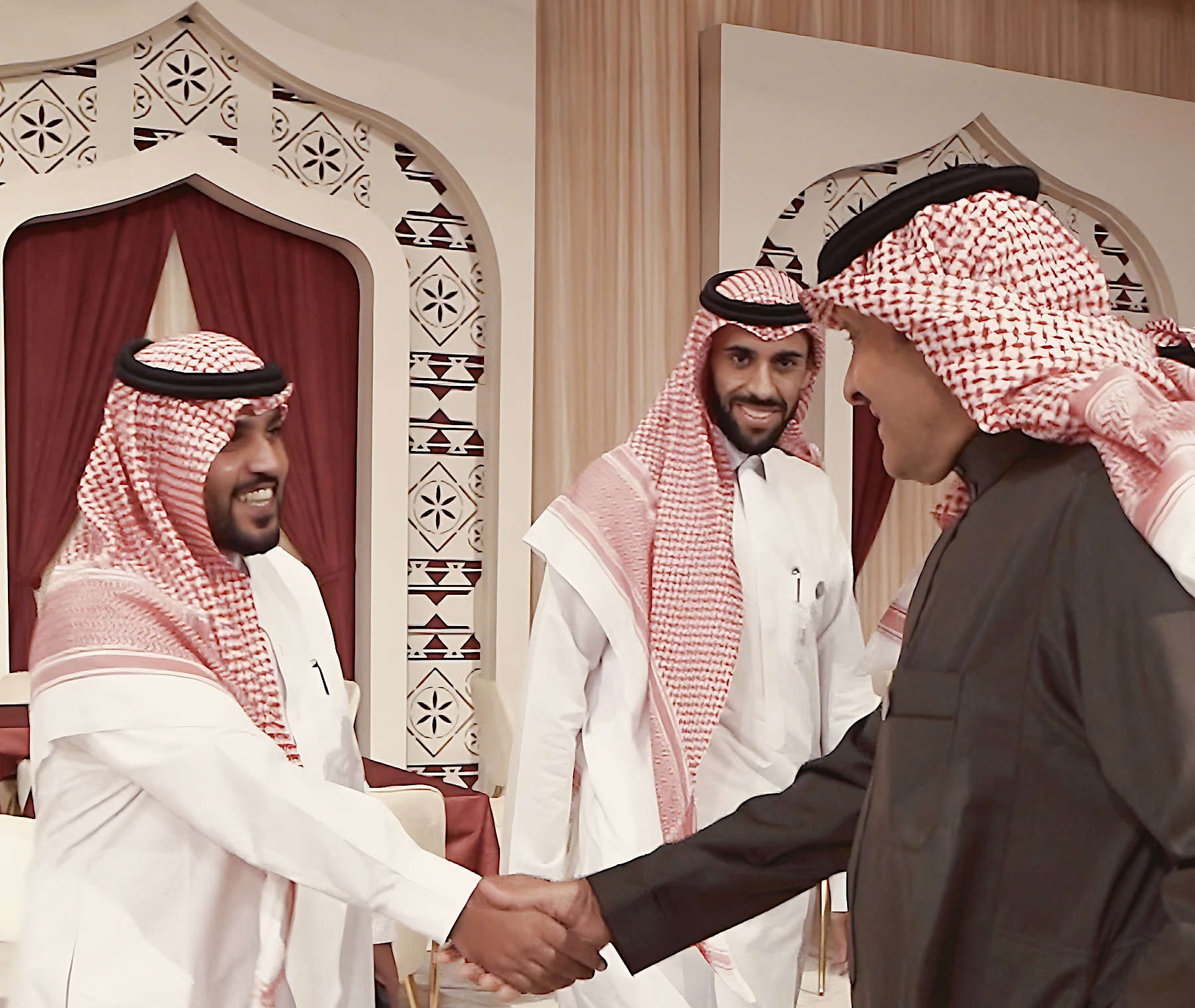 Handshake at an official majlis reception
